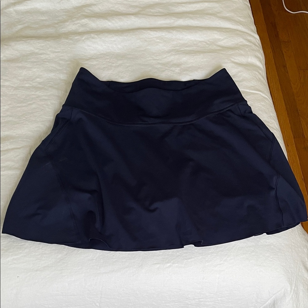 Athleta Navy Blue tennis Skirt with built in shorts